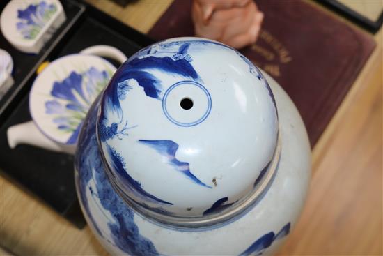 A pair of Chinese blue and white jars and cover and a pair of blue and white vases